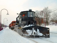A pair of CP SD40-2's (CP 5788 & CP 5926) along with spreader CP 402893 are stopped near Montreal West station after clearing the Westmount sub. This was a week after after a record-breaking storm dumped about 45 cm of snow on the island of Montreal.