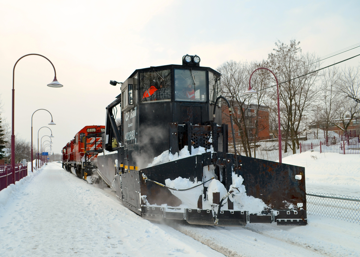 A pair of CP SD40-2's (CP 5788 & CP 5926) along with spreader CP 402893 are stopped near Montreal West station after clearing the Westmount sub. This was a week after after a record-breaking storm dumped about 45 cm of snow on the island of Montreal.