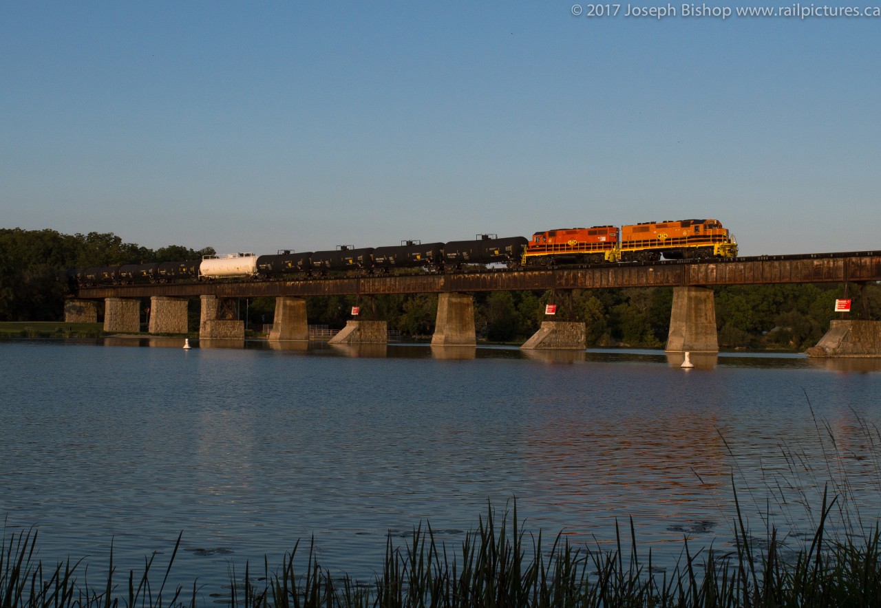 RLHH 597 slowly crosses the Grand River in Caledonia with QGRY 2301, RLHH 2081 and 57 cars on a gorgeous fall evening.