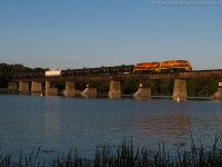 RLHH 597 slowly crosses the Grand River in Caledonia with QGRY 2301, RLHH 2081 and 57 cars on a gorgeous fall evening.