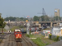 CN 527 with CN 5634 & CN 2000 for power is through the s-curve at Turcot West, a view only possible since a tunnel was demolished here in 2016. Soon the view will change again, with the tracks being moved around the curve at left.