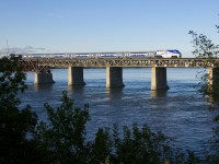 <b>One week only.</b> Due to emergency work being performed on Autoroute 138 in Montreal this week, Candiac-line trains had extra cars added, and even one train consisting entirely of multilevel cars. These cars have not been in use on this line since 2013, when the Comet cars came back from refurbishing. Today was the last day that the multilevel consist was in use. Here it deadheads back to the South Shore during the morning rush hour as it crosses the St. Lawrence River.