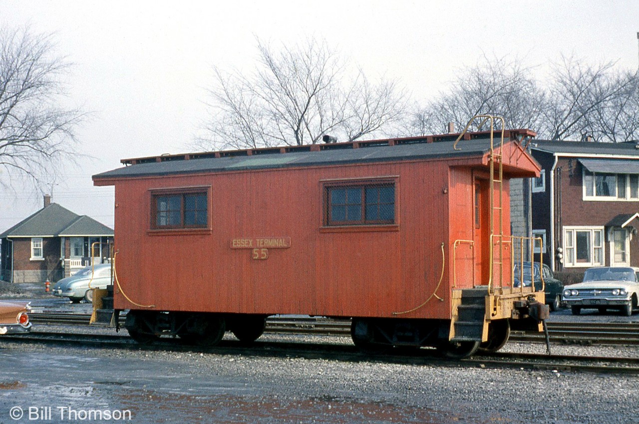 Essex Terminal Railway van 55, a vintage wooden caboose likely dating from the early 1900's and still sporting old arch bar trucks, is pictured in Windsor in 1965. Its disposition is unknown, but a small steel caboose eventually took over 55's number in the late 70's (the "second" ETR 54 & 55 were ex-PC/PRR steel vans acquired used from Conrail). Two of 55's sister wooden vans survive: 53 is presently on display at the CN Essex Station, and sister 54 is at the Gibson Gallery in Amherstburg (both vans built circa 1907).