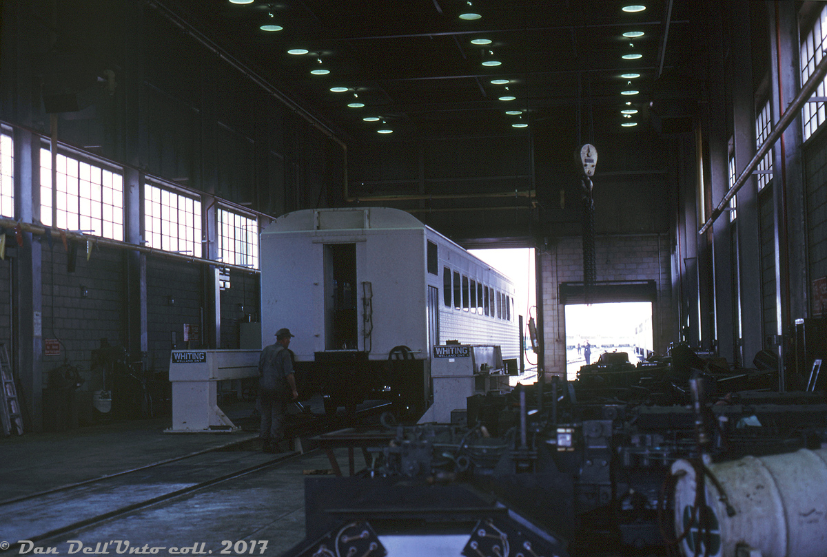 A GO Transit 4700-series Hawker Siddeley single-level commuter coach sits inside GO's maintenance facilities at their home base in Mimico, receiving some attention from shop crews by the Whiting drop table.

GO was originally set up in part of the old CN Mimico freight yards (CN moved a lot of their freight operations out of the city proper, and to Toronto (MacMillan) Yard in Vaughan). The old CN Mimico Carshops were used as GO's early maintenance facilities when they started up in the late 60's, until new modern ones were built at Willowbrook Yard.

Photographer unknown, Dan Dell'Unto collection (via John Knight).