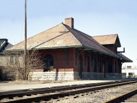 This pretty well forgotten station used to sit between Water St and State St (now Ainslie St S)just to the south of Concession St (old Hwy 97) in the Galt downtown area. This sub trackage came up from Lynden Jct and was crossed by the old LE&N electric just a hundred yards or so S of the station. But it is all history now. Everything. The land on which stood the old depot is now a row of modern townhouses, and evidence that there was once a busy railroad thru here is long gone. So much so, that on a recent visit to the area I was unable to uncover any indication as to the station location, and have group member Terry O'Shell to thank for the information for this caption. I have not the date of demolition for this structure but I believe it was early 1980s.