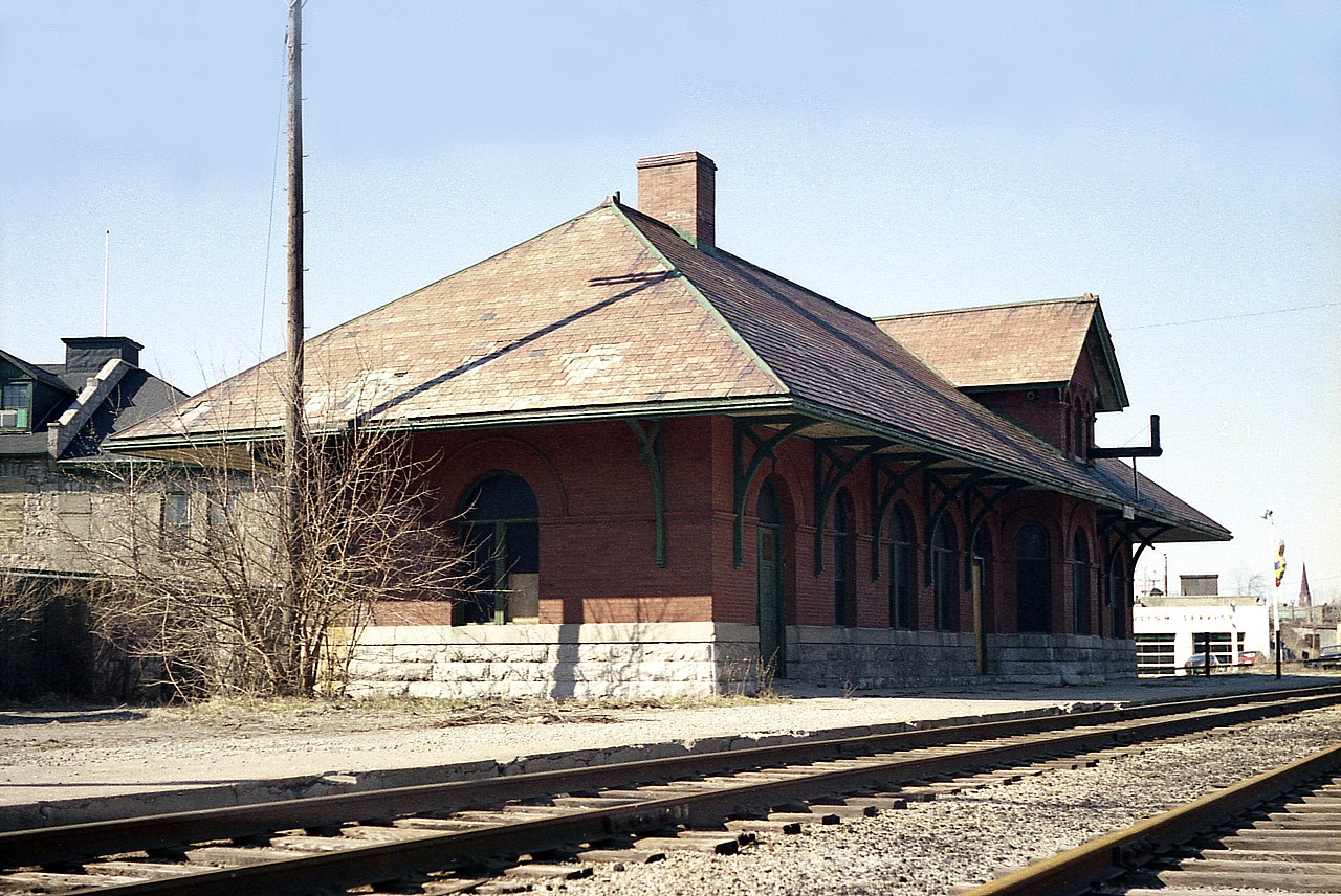 This pretty well forgotten station used to sit between Water St and State St (now Ainslie St S)just to the south of Concession St (old Hwy 97) in the Galt downtown area. This sub trackage came up from Lynden Jct and was crossed by the old LE&N electric just a hundred yards or so S of the station. But it is all history now. Everything. The land on which stood the old depot is now a row of modern townhouses, and evidence that there was once a busy railroad thru here is long gone. So much so, that on a recent visit to the area I was unable to uncover any indication as to the station location, and have group member Terry O'Shell to thank for the information for this caption.  I have not the date of demolition for this structure but I believe it was early 1980s.