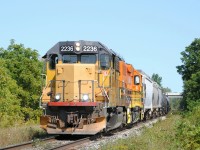 GEXR 580 led by LLPX 2236, rolls by Breslau just east of Kitchener. Later, they will take a cut of cars from the Kitchener yard and interchange it with CP.