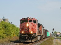 A wonderful "All Canadian Cab" lashup pulls a rather later M385 through the town of Strathroy