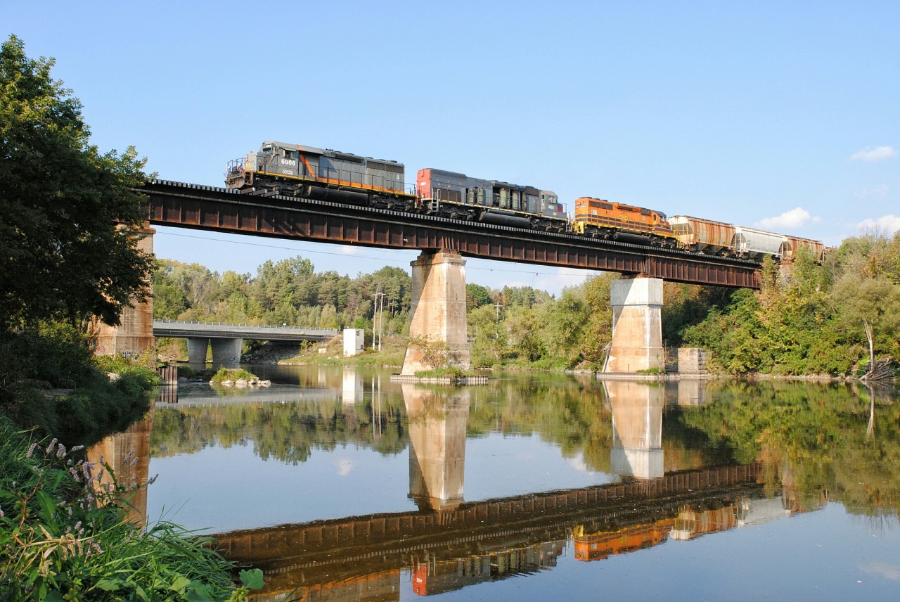 As an inspiration to Stephen C Host's shot which can be found when you click or search the link http://www.railpictures.ca/?attachment_id=17812 , GEXR 431 crosses the Grand River approaching Kitchener. Not the 100% same angle but the area is amazing!