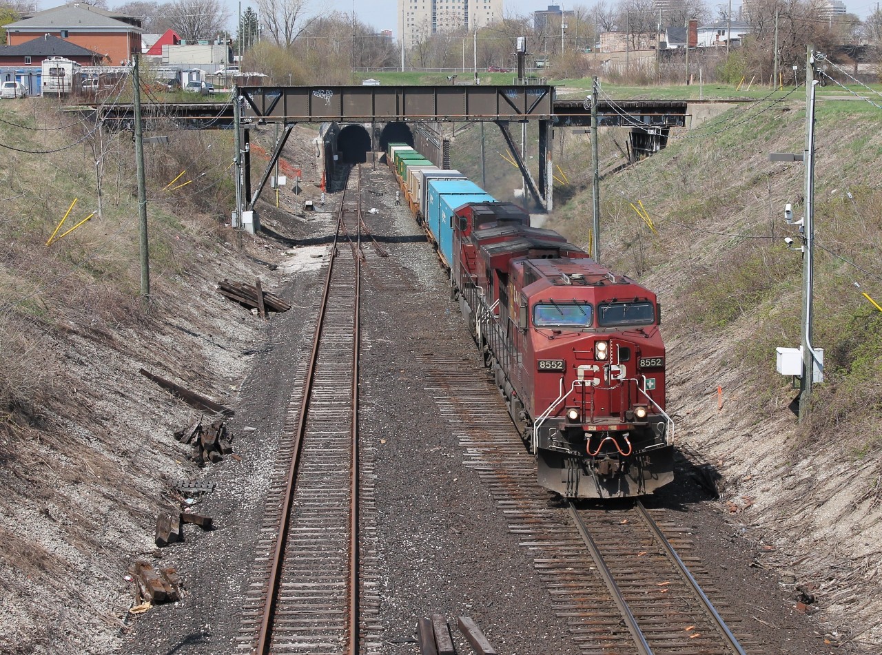 CP 142 emerges from the Detroit River Rail Tunnel with a pair of toasters.