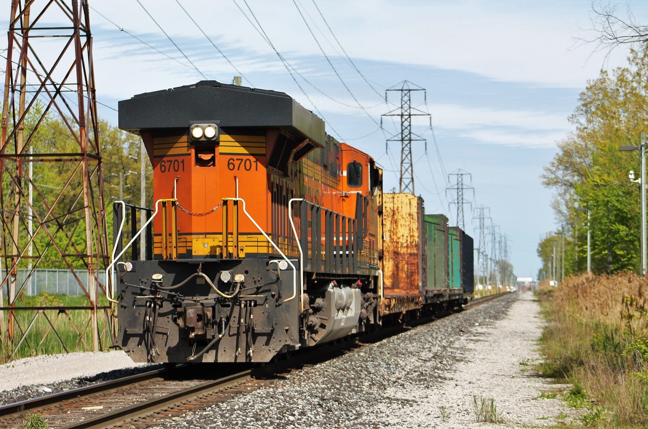 CP T-42 is returning to Windsor Yard after servicing the CS Wind wind turbine plant and doing some yard work in Walkerville Yard. For a couple of days in May, CP was using a big BNSF GEVO for all of the local yard and switching duties.