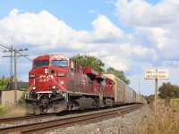 It's funny how you can pass by certain locations over the years and never give them a second thought. For me the CP crossing at Steeles Ave in Milton is one such place. Even though I've worked in Milton for over twenty years, I have only stopped here once before. Granted todays power on train 147 was about as boring as it gets these days on CP, but the lighting seemed to help make the shot. In the distance 147's tail end is just clearing the bridge carrying CN's Halton sub. over the Galt sub. Milton is in the background as well, for now anyway, as most likely within the next couple of decades urban sprawl will drastically alter this location. 
