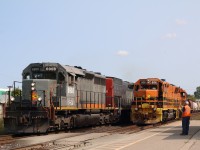 It's not very often one can catch a pair of Goderich Exeter trains meeting at Georgetown, but yesterday was one of those rare occasions. Here we see the power from 582 sitting in front of the station after exchanging the dimensional loads to CN, as road train 431 passes behind. The light power would follow 431 up the hill and into Guelph.