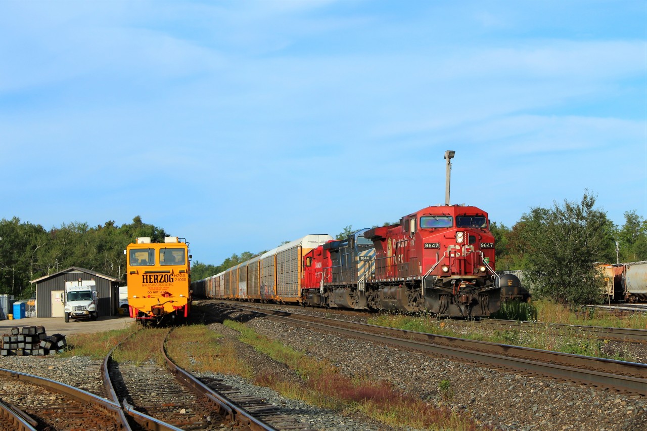 Guelph Junction was unusually busy this morning with three trains travelling through within forty five minutes. Here, eastbound CP 9647 with CEFX 1044 and CP 3033 pass the waiting Herzog train waiting in Ham. one. CP 235 and CP 142 would complete the trio.