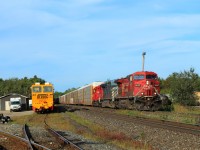 Guelph Junction was unusually busy this morning with three trains travelling through within forty five minutes. Here, eastbound CP 9647 with CEFX 1044 and CP 3033 pass the waiting Herzog train waiting in Ham. one. CP 235 and CP 142 would complete the trio.