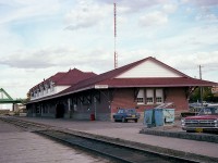 Drive by the old CP station in Lethbridge and the surroundings look nothing like this. Fortunately the structure was deemed 'Heritage' in 1987, and it has lived on as the Lethbridge Community Health Centre for the past 3 decades. The mainline was pulled up and moved north out of the downtown area in 1984. The former yard was relocated east to Coalhurst and a shopping mall occupies the spot. This beautiful station, built in 1905/06 came into prominence as a division point back around when the town used to be called Coalbanks. Over the years a considerable amount of CP traffic was coal from the west out of the Crowsnest Pass area. In keeping with the station's railroad theme, an old steam engine, the MLW 3651, a 2-8-0, is on display there.