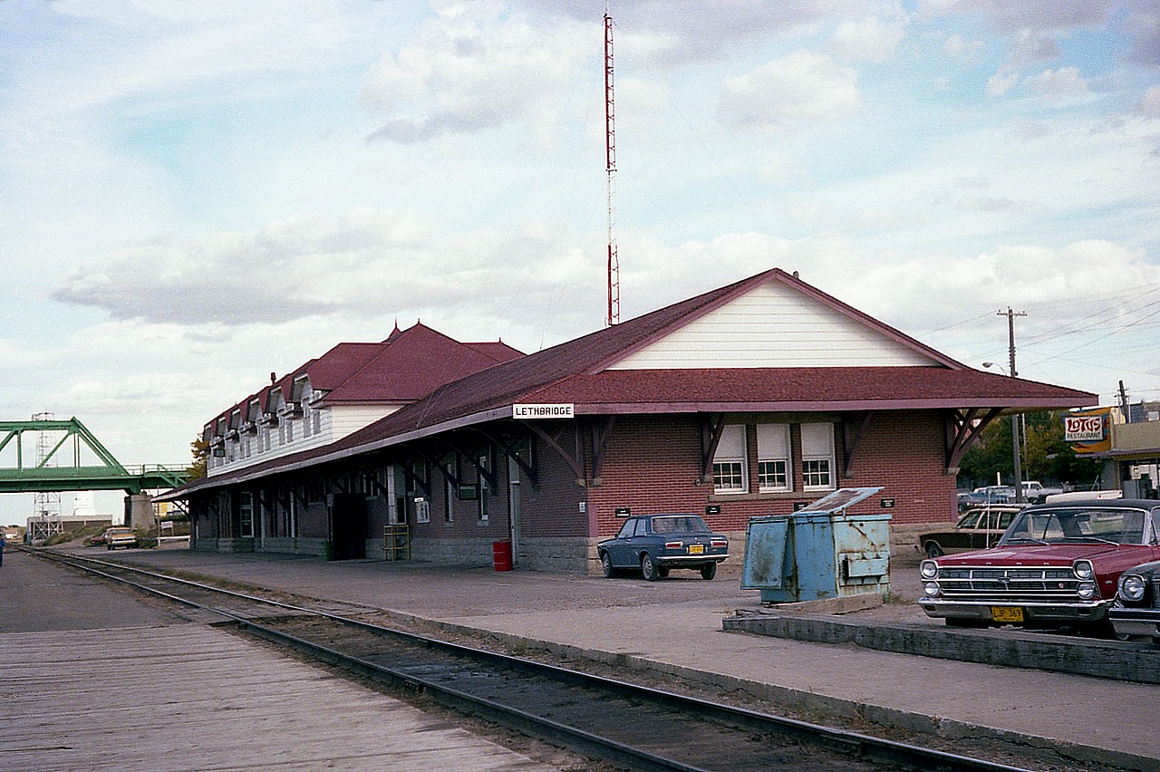 Drive by the old CP station in Lethbridge and the surroundings look nothing like this. Fortunately the structure was deemed 'Heritage' in 1987, and it has lived on as the Lethbridge Community Health Centre for the past 3 decades. The mainline was pulled up and moved north out of the downtown area in 1984. The former yard was relocated east to Coalhurst and a shopping mall occupies the spot.  This beautiful station, built in 1905/06 came into prominence as a division point back around when the town used to be called Coalbanks. Over the years a considerable amount of CP traffic was coal from the west out of the Crowsnest Pass area. In keeping with the station's railroad theme, an old steam engine, the MLW 3651, a 2-8-0, is on display there.