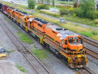  4 locos St-Lawrence & Atlantic 804-3804-3047-3008 and Québec & Gatineau 3105 pulling car in the Southwark yard on rte 393  this train droop cars in the yard and pick up others cars and go back on rte 394 to Sherbrooke and Richemond P.Q . photo from a gateway over tracks for me al emd GP 40