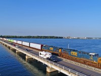 Montreal-Selkirk NY Canadian National #327 is crossing the Beauharnois Canal(St Lawrence Seaway)at Valleyfield Qc