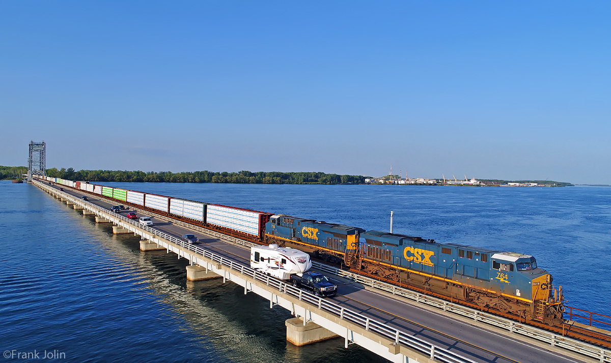 Montreal-Selkirk NY Canadian National #327 is crossing the Beauharnois Canal(St Lawrence Seaway)at Valleyfield Qc