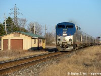 Here's whats left of any CN structures at Beamsville, this shed being used for the CN MOW team. The "Maple Leaf" is passing by on this warm spring day back in March. Gotta love the very low spring evening light at this time of year.

