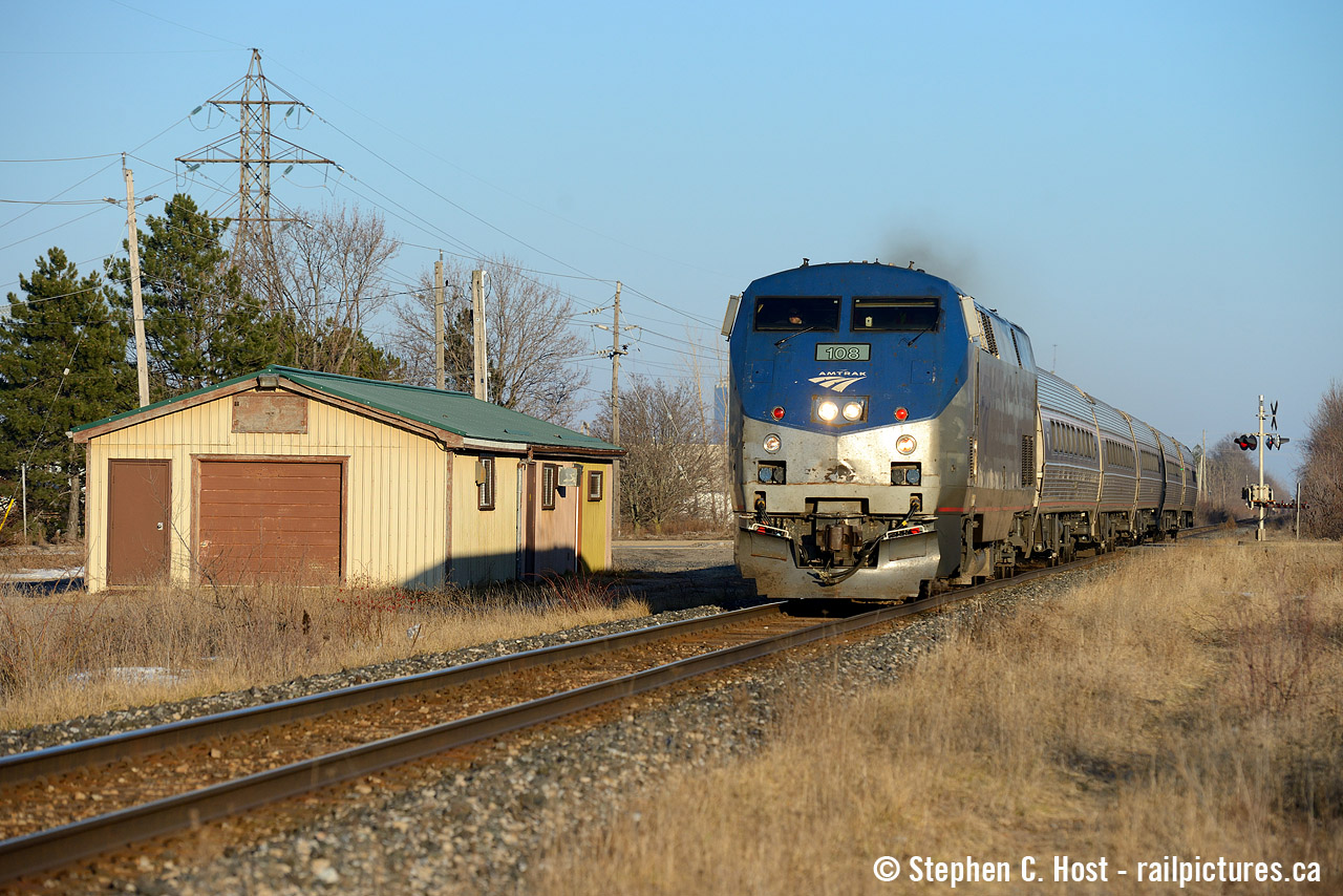 Here's whats left of any CN structures at Beamsville, this shed being used for the CN MOW team. The "Maple Leaf" is passing by on this warm spring day back in March. Gotta love the very low spring evening light at this time of year.