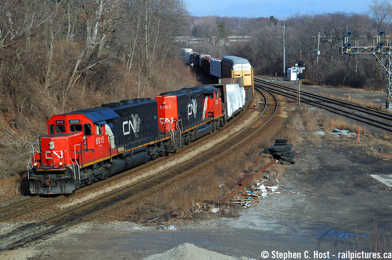 So Arnold's recent pic from Feb 2006 had me looking back to see where I was that day - Probably nursing a Hangover - I wasn't anywhere near Paris at that time of year. Here's my closest outing to Arnold's day. But do you kids REALLY want to know that THIS was mundane? From SMM who posted his report of what happened on this day to the FPON Yahoo Group ( subscribe  to read, it's insane what went on back then!), and this list only notes the 'good' trains:

CN393 CN2557-UP9308 11:38
CN394 BNSF7819-BNSF984 11:50
CN148 CN5776-NS/CR4812-GCFX6077 12:34
CN411 CN5729-BNSF7856 14:25
CN278 BNSF868 14:56
CN390 BNSF7846-BNSF8060-CN2590 16:14

 I also managed to shoot CP 230 with STLH 5615 leading, 5687 trailing at 0800 and a CP Eastbound on the way home with 8700 and CEFX 139 (sd90mac in maroon) at Guelph Jct. 

If anyone can note the train number of this westbound , please comment if you can. Thanks!