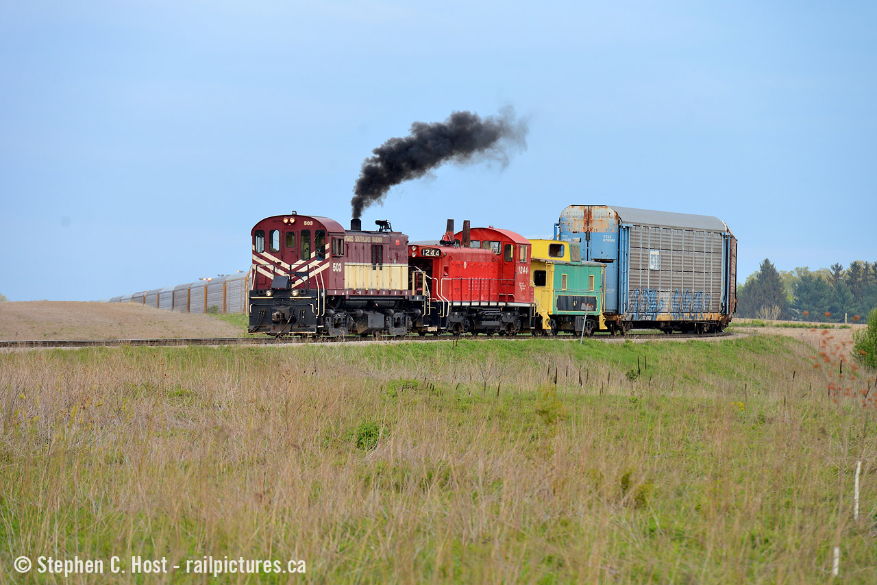 OSR Engineer Joe Dennis is heavy on the throttle as they shove a cut of autoracks into the General Motors CAMI Automotive plant. For a brief period in spring RS-23 503 made an appearance on this job and I was driving through to Sarnia, able to catch them real quick before continuing west. Really, you can't go wrong with any time spent on the OSR. Thanks boys for the show.