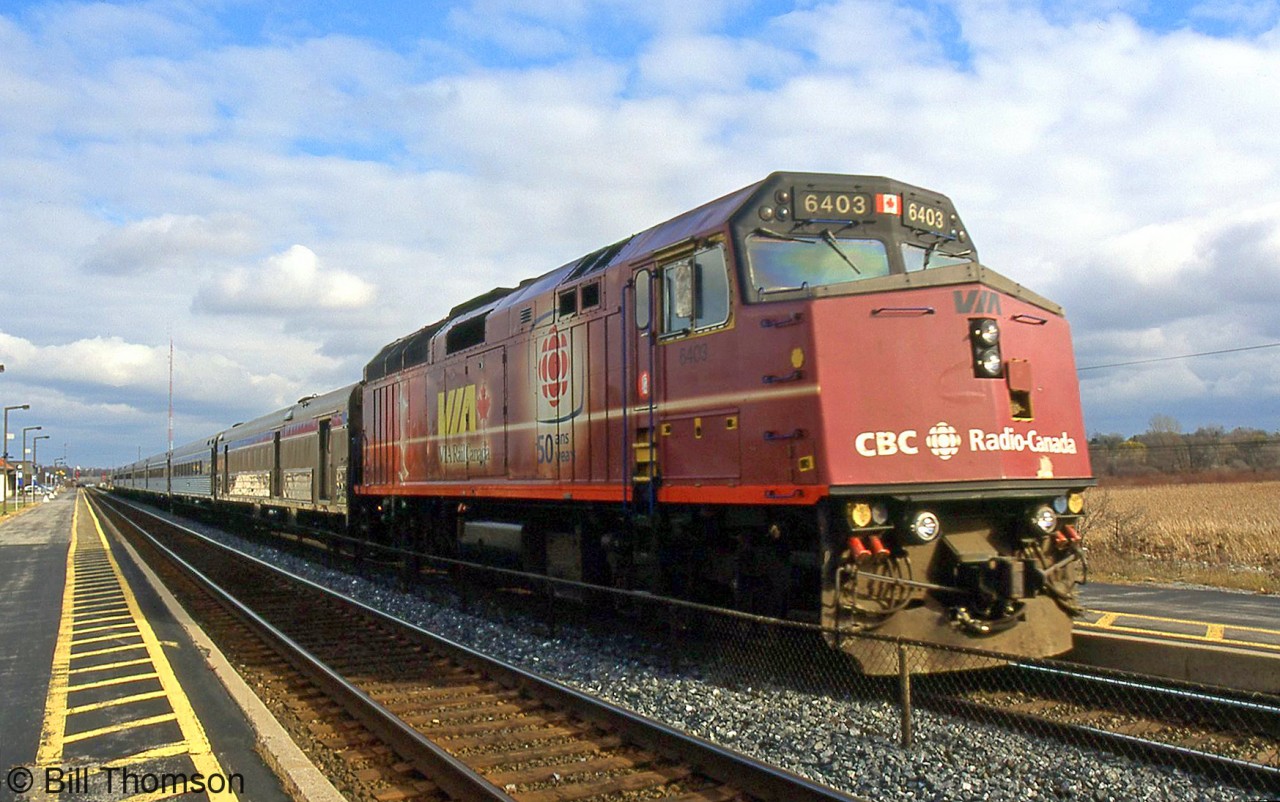 CBC-painted VIA F40PH-2D 6403 leads VIA train #57 westbound, at Kingston Station on November 17th 2005. This unit would later be refurbished, and featured on the new polymer $10 bill (and subsequently renumbered to 6459 later).