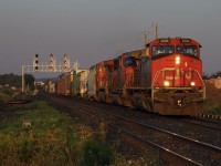 In blinding morning light, a late 398 rolls through Mount Pleasant, soon approaching its destination of Mac Yard. 