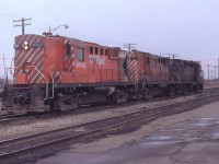  A C&O Canadian crew has borrowed a set of CP RS-18's to head over to West Detroit to rescue an outlawed C&O Puller. Before heading over, the crew had stopped in to the Penn Central Windsor Depot to chat with the Operator and somehow I ended up this day getting a ride over to West Detroit and back (I was only 15 when I shot this).