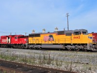 UP 4442 an SD70M is parked at the shop's east end while a GP20eco has running maintenance checks performed.