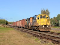 With the sun quickly setting, 1733 and 1730 pass through Arntfield (part of Rouyn-Noranda since 2002) on their way back to Ontario.  Interestingly, this line between Swastika, ON and Rouyn-Noranda, QC is, on paper, operated as the Nipissing Central Railway (NCR).  The NCR was provincially chartered in 1902 as an interurban streetcar system that connected several communities in Northern Ontario.  With the towns growing, the railway was granted a federal charter five years later and then, in 1911, the provincially chartered Temiskaming and Northern Ontario (T&NO - the predecessor to the Ontario Northland Railway) purchased the NCR.  So when the T&NO built the line between Swastika and Rouyn-Noranda, it was operated under the federally chartered NCR to avoid any complications that could be associated with crossing between two provinces.