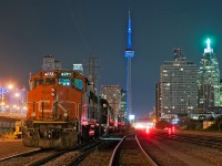 Before heading down to the harbour spur, I snap a few photos of my train with a pair of widecab GP38's sitting east of the Scott St. ladder on the TTR.