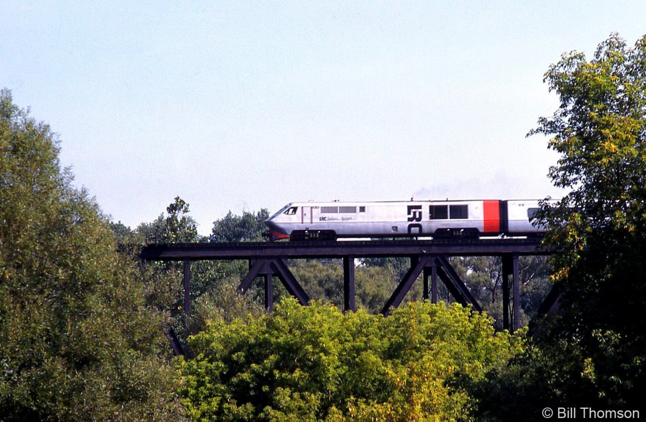 Bombardier's test/demonstrator LRC locomotive JV1 (and matching coach) is seen here testing on CN's Strathroy Sub, crossing the Thames River bridge at London.