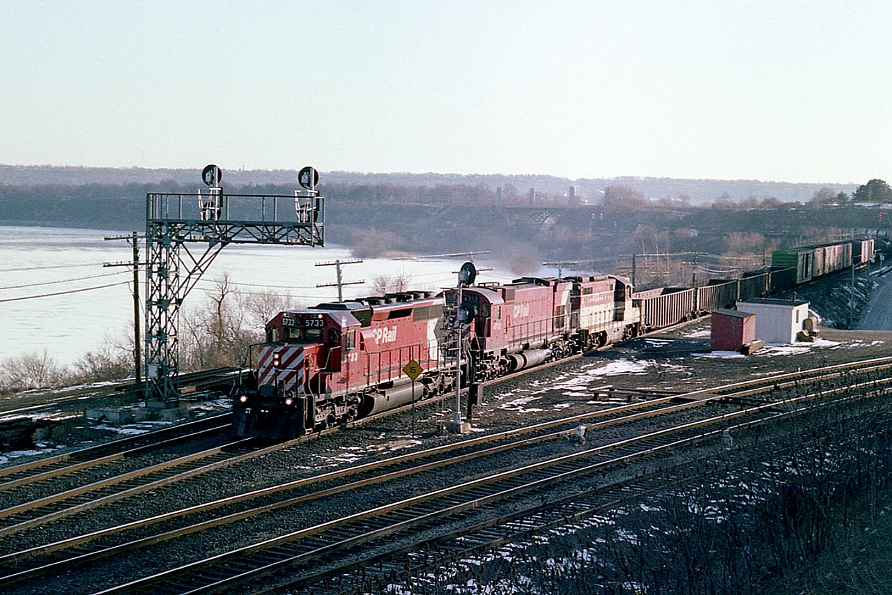 It wasn't often that the Starlite, even in the longer days, came out of Hamilton on the return trip to Toronto when there was still enough daylight for a decent photo.  The glare of the sun off the locomotives can't be helped, but the result is still a pretty good image taken from an angle not often utilized at the Jct. The fact it was a bit of a hazy sky probably saved this from being a washout.  CP 5733, 4712 and TH&B 401 is the power.