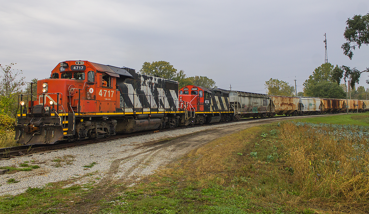CN's local L514 always seems to be a surprise...no matter how you try to capture it. Despite the poor weather, there was reason enough to come out and photograph it as a venerable old pair of zebra stripes were on point in 4717 and 4114. Old horses, old and rustic looking grain cars along with a line that was once mighty. It doesn't get any better than this!