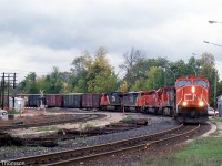 CN train 450 from North Bay heads through Washago on the Newmarket Sub, lead by CN SD75I 5797, C44-9W 2689, borrowed CP SD40-2 5870, C40-8M 2434 and C44-9W 2530.