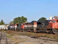 <b>Double the consist!</b>

CN 8872, BCOL 4607, CN 8879, and BCOL 4620, lead CN M39491 18 through Brantford with 157 cars in tow