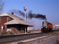 Nice looking afternoon back at the end of October 1979 as CP 8730, an RS-18, works a cut of cars at the Canada Cement (Lafarge)siding at Zorra Station. Pity the station has been gone more than 30 years. It made a nice prop for smokey MLW images back in the day...........