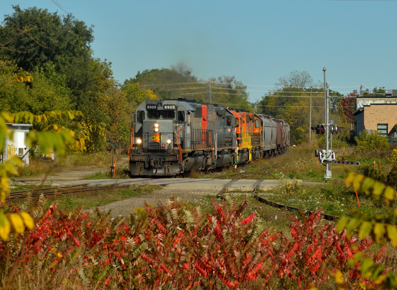 Thanksgiving weekend was warm this year, and here is 431 headed back to it's home terminal of Stratford passing through (ex CN) Guelph Jct.  Not much for fall colours this year, maybe next.