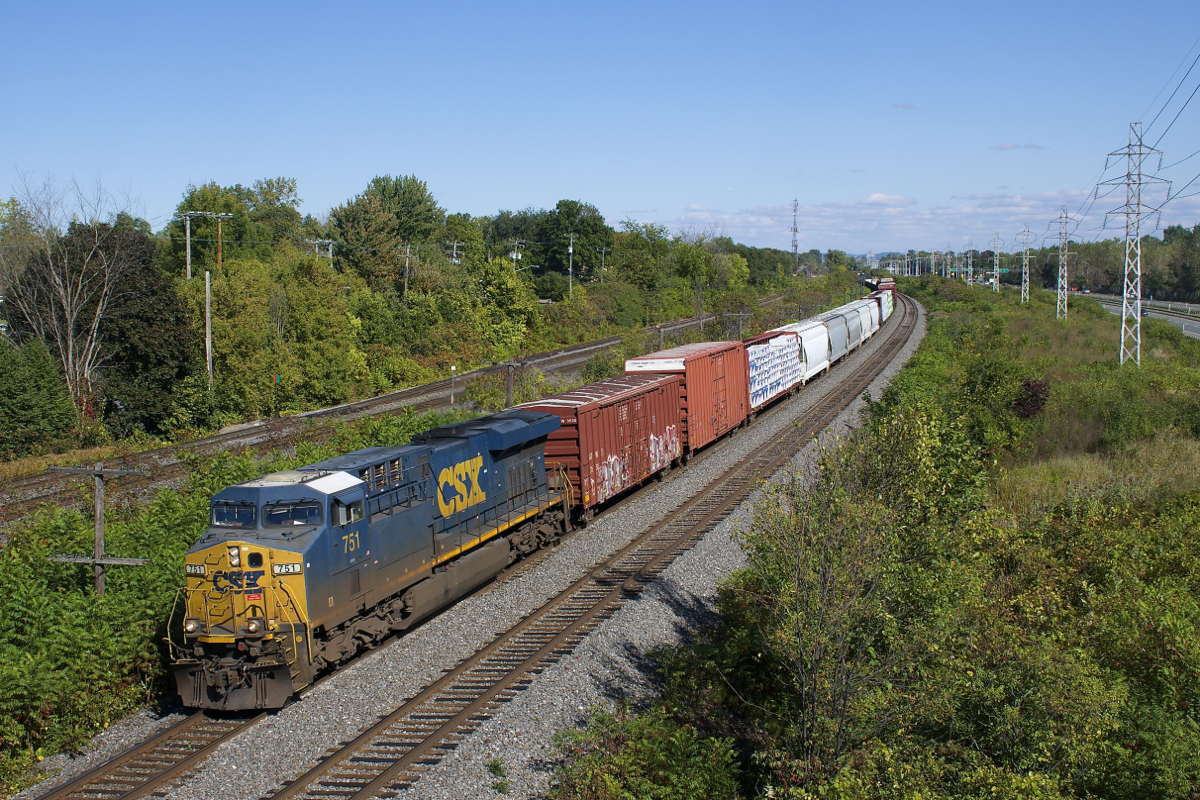 CSXT 751 is the sole power on a 53-car CN 327 as it heads west through Beaconsfield on the north track of CN's Kingston Sub. This is the first time I've seen this train with only one engine.