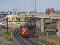 CN B730 is leaving Turcot West after getting a new crew to take it to Joffre Yard. This heavy and lengthy 205-car train has four GE units for power, with CN 3070 & CN 3112 up front, CN 3062 mid-train and CN 2965 bringing up the rear.