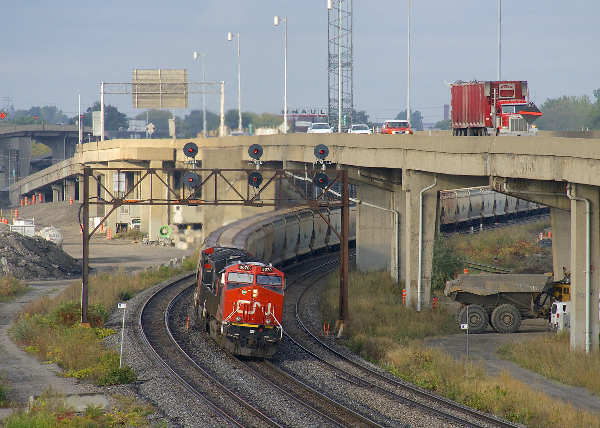 CN B730 is leaving Turcot West after getting a new crew to take it to Joffre Yard. This heavy and lengthy 205-car train has four GE units for power, with CN 3070 & CN 3112 up front, CN 3062 mid-train and CN 2965 bringing up the rear.