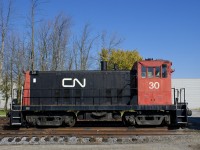 Once used as a shop/yard switcher for Exporail, 70-tonner CN 30 has been replaced by more powerful and more recently acquired units, namely GP9 CP 1608 and SW1200RSm CN 1382 and no longer runs. Here it sits out in the open on a fall morning. 