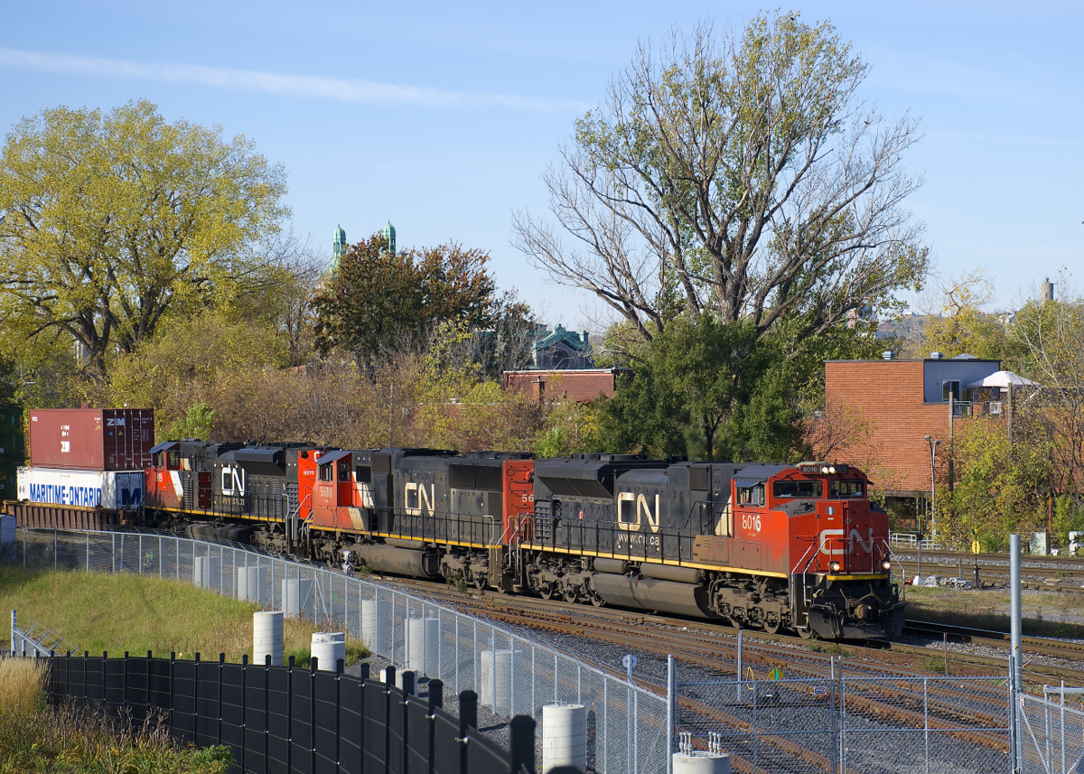 CN 120 has three EMD's up front (CN 8016, CN 5680 & CN 8919) with a fourth mid-train (CN 8851) as it passes the railfans park and the entrance to the RTM's maintenance centre.