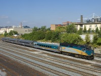 VIA 84 from Sarnia is almost at its destination of Union Station as VIA 6453 leads the mixed consist towards the Bathurst Street overpass.