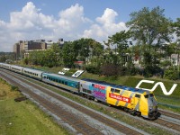 VIA 72 has 5 rebuilt LRC cars (none of them wrapped for Canada 150 celebrations) trailing wrapped VIA 913 as it heads on the Oakville Sub in Toronto.