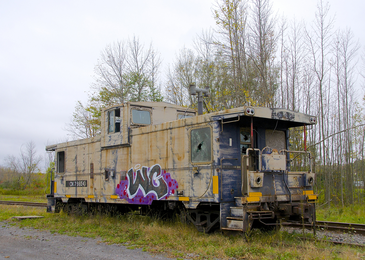 As seems to be the case every weekend, caboose CN 79834 is seen parked in Vankleek Hill on CN's Vankleek Spur. This caboose was built by CN in their Pointe St-Charles shop in Montreal under the same number. CN sold it to the Ontario L'Orignal Railway (OLOR) in 1996, which was taken over by the Ottawa Central Railway. In 2008 CN took over the Ottawa Central and renumbered the caboose back to its CN number. It is used for backup moves on the L'Orignal Spur and is in progressively worse shape.