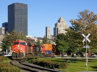 CN 149 is leaving the Port of Montreal with brand new ES44AC CN 2986 trailing. Leading is an ES44AC built in 2015, CN 2971.